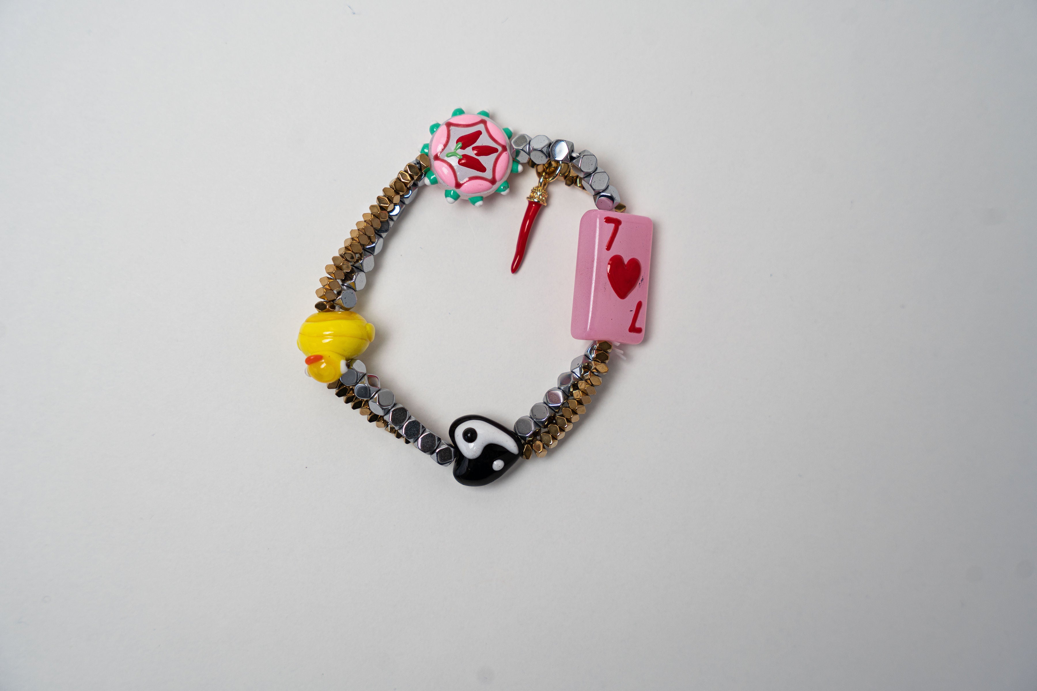 PULSERA ELASTICA DIJE DE COLORES