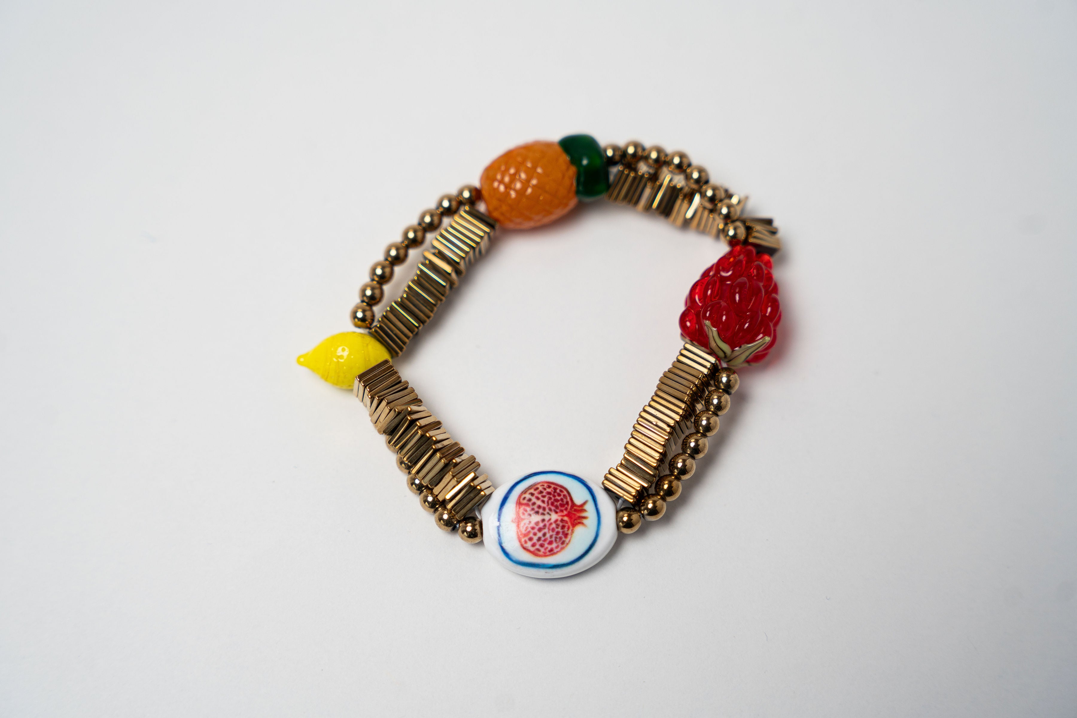PULSERA ELASTICA DIJE DE COLORES