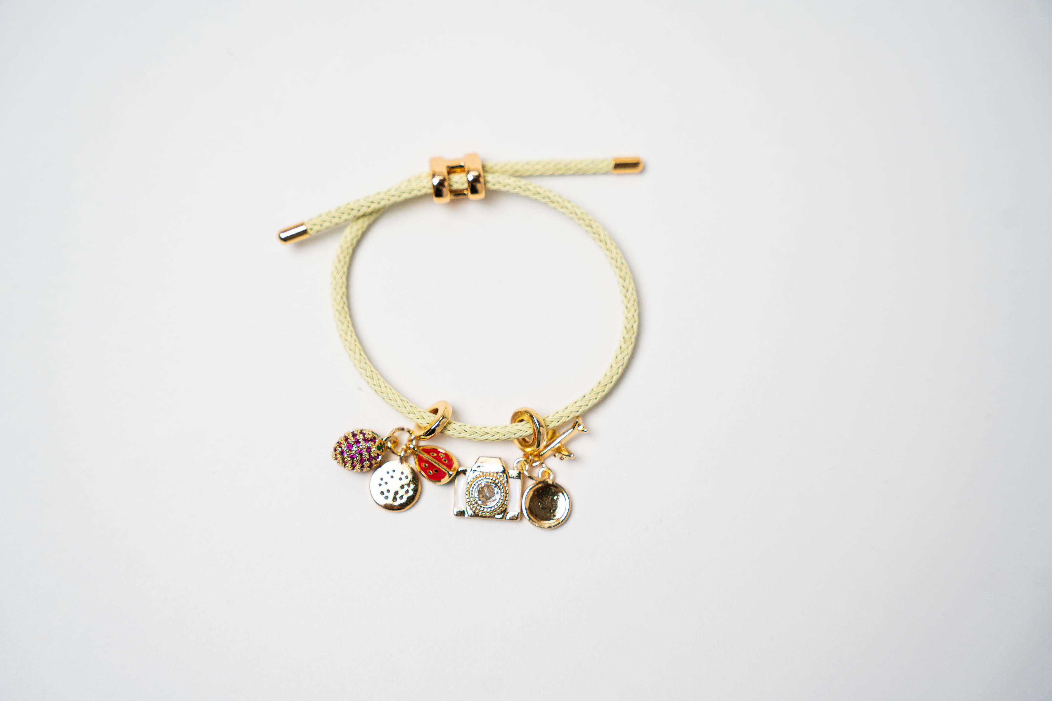 PULSERA CORDÓN COLORES DIJES